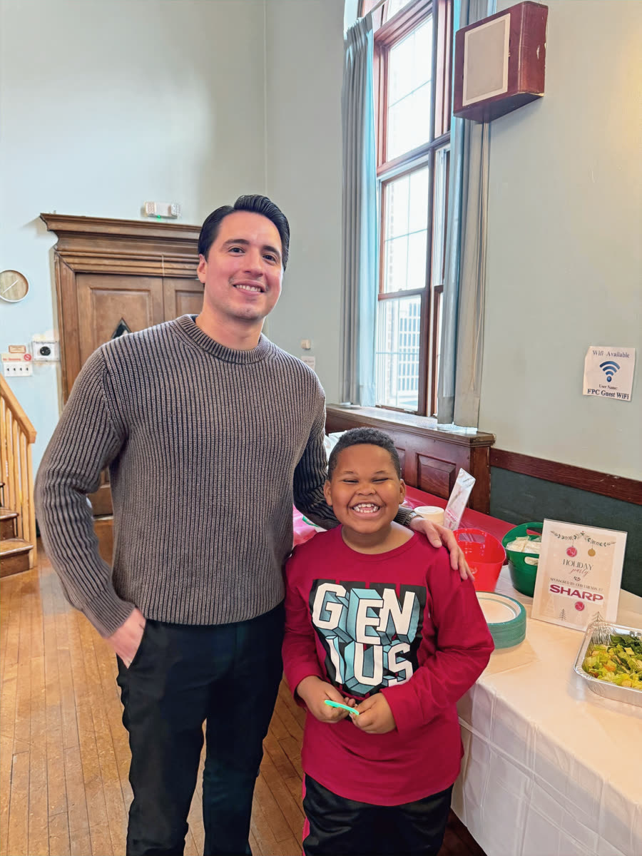 A Bergen Volunteers mentor with a smiling young mentee